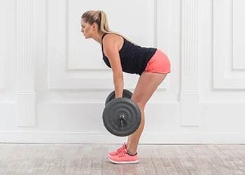 woman practicing deadlifts