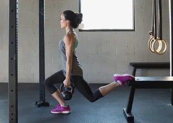 Woman doing split squats