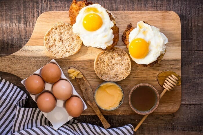 Eggs, bread and honey for nutritious breakfast
