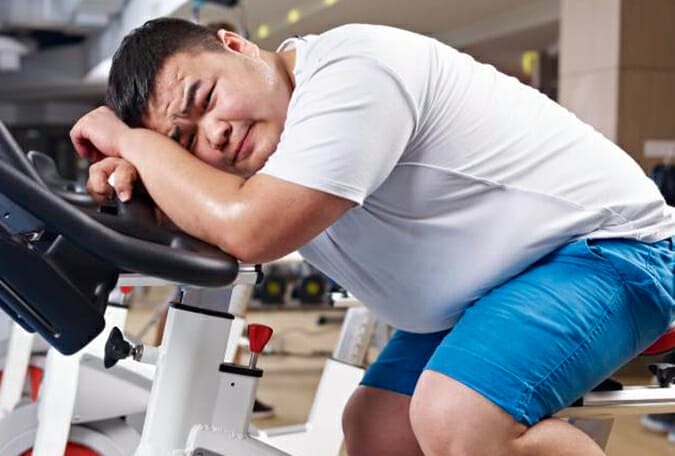 man sleeping on gym