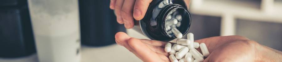 man taking medicine