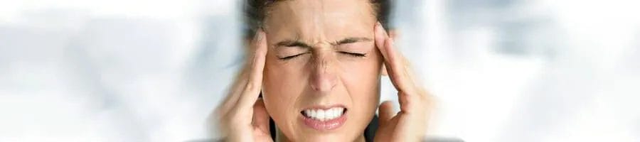 Hourglass side effects, woman with headache