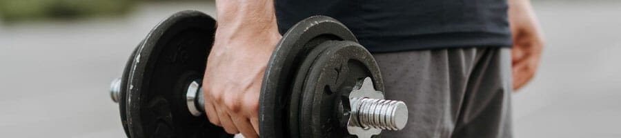 man holding a barbell