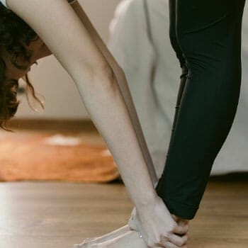 woman doing a hamstring stretch