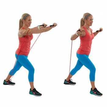 female doing an incline press with resistance band