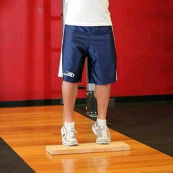 man showing calf raises