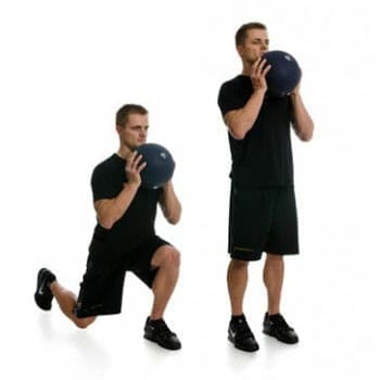 man doing overhead lunges with slamball