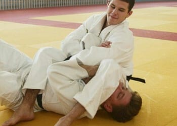 mwn doing judo grappling technique