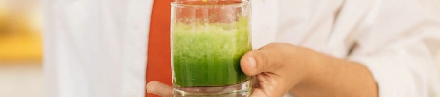 woman holding a smoothie