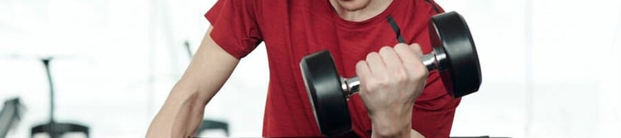 person doing dumbbell exercises