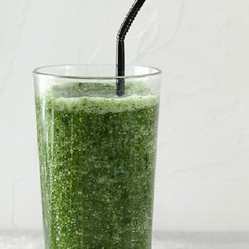 smoothie in a glass with a straw