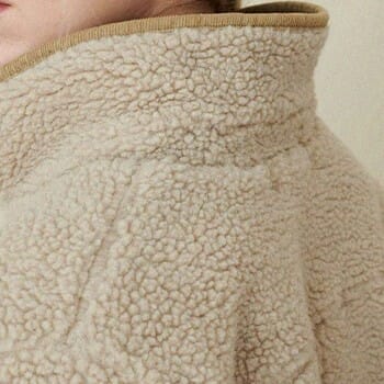 Fleece fabric wearing by a woman on her back