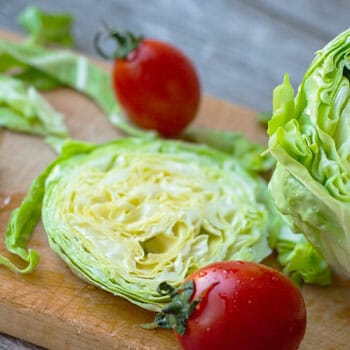 tray full of sliced cabbages and tomatoes