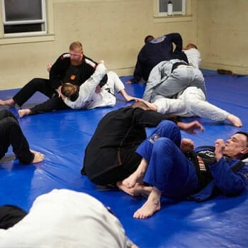 a group of people dueling