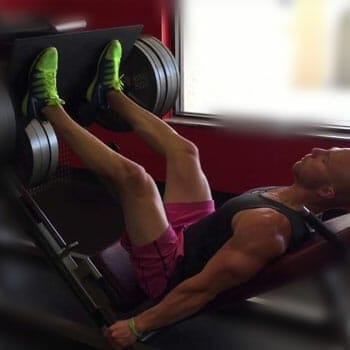 man working his leg out using a leg press machine