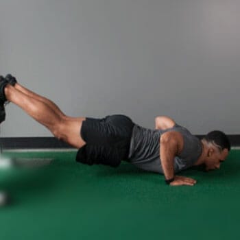 man in a push up position