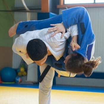 men practicing judo by dueling