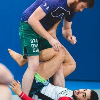 men learning judo take down