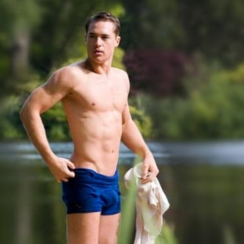 alexander dreymon beside a river, shirtless