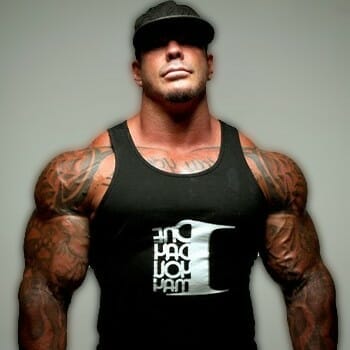 Rich Piana standing up straight with great posture