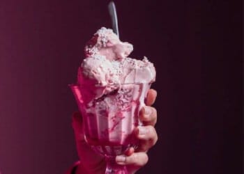 cup filled with strawberry ice cream