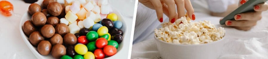 bowl filled with candies, close up image of a woman grabbing popcorn from a bowl