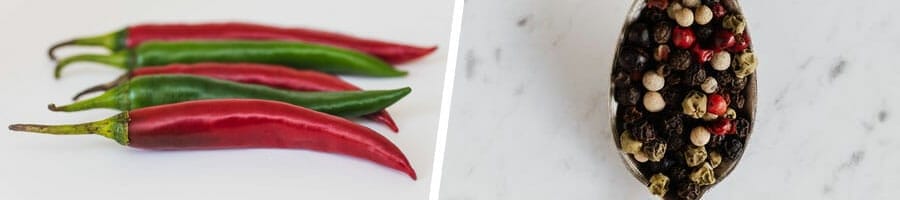 close up image of fresh cayenne pepper, and a spoonful of black pepper