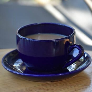blue mug filled with hot coffee