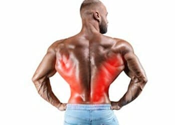 shirtless man showing his back with his lats highlighted