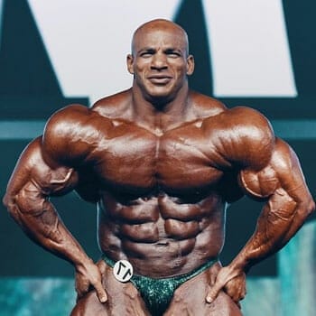 big ramy posing with his muscle out on stage