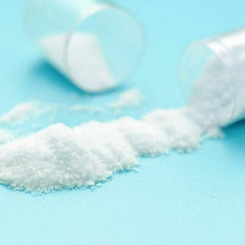 close up image of a pill broken into two