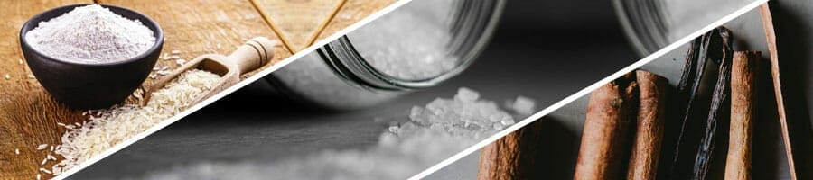 bowl filled of flour, jar pouring salt grains, cinnamon sticks