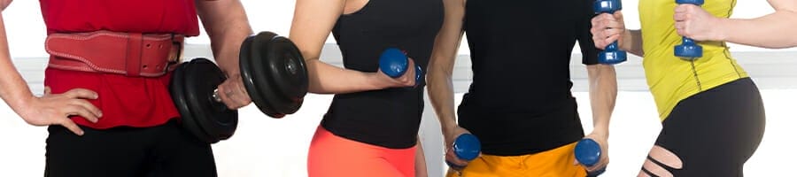 Group of people holding dumb bells