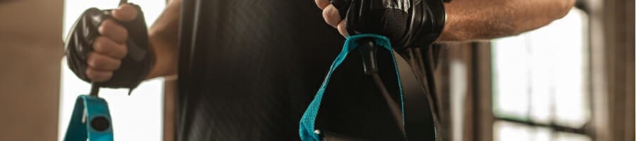 Anonymous person holding resistant bands