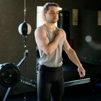 man cooling down inside a gym