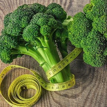 Broccoli wrapped in measuring tape