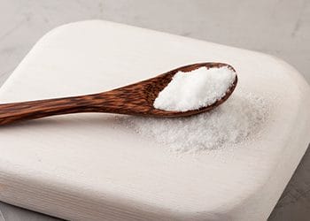 powder in a wooden spoon