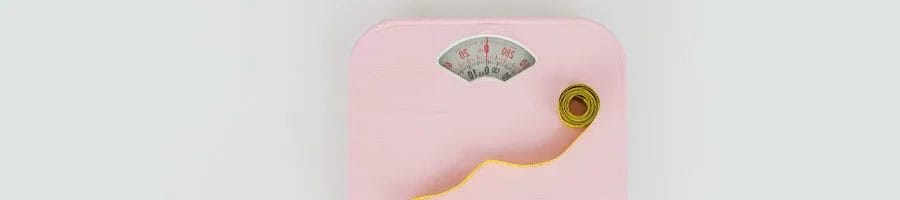 measuring tape on a weighing scale