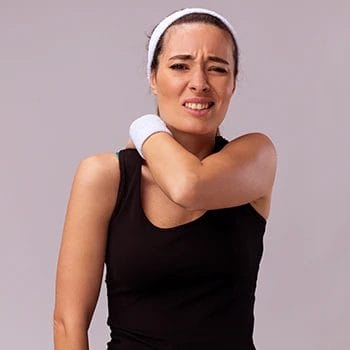 A woman experiencing itchy skin as a side effect