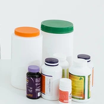 Different supplement products on a white background