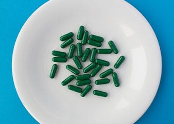 green capsules on a plate