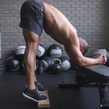 man in a donkey calf raise position