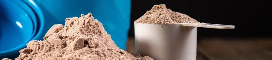 Protein powder on a small cup