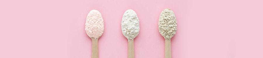 3 spoons with different powder