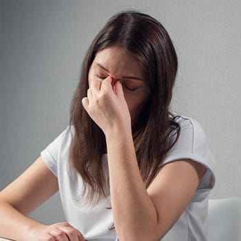 woman experiencing pain