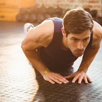 man in a push up position