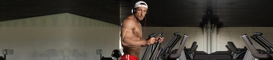 shirtless man working out