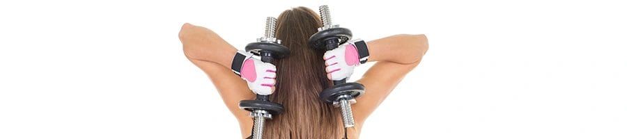 woman using dumbbells for her triceps