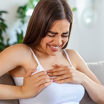 A woman having a chest pain