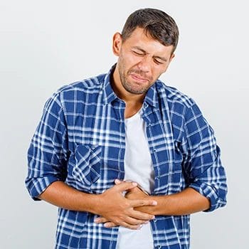 A person experiencing indigestion